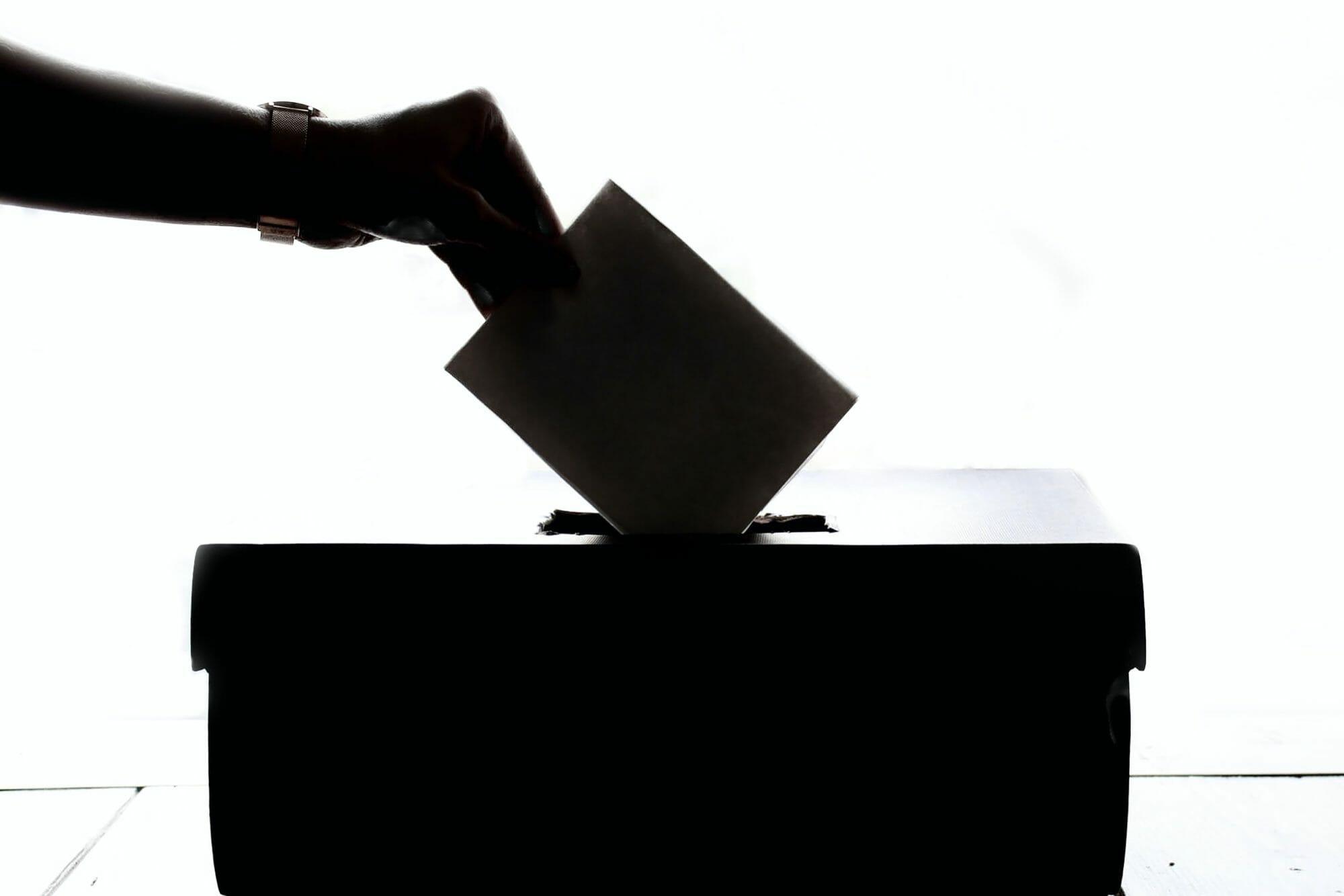 Ballot being dropped into ballot box