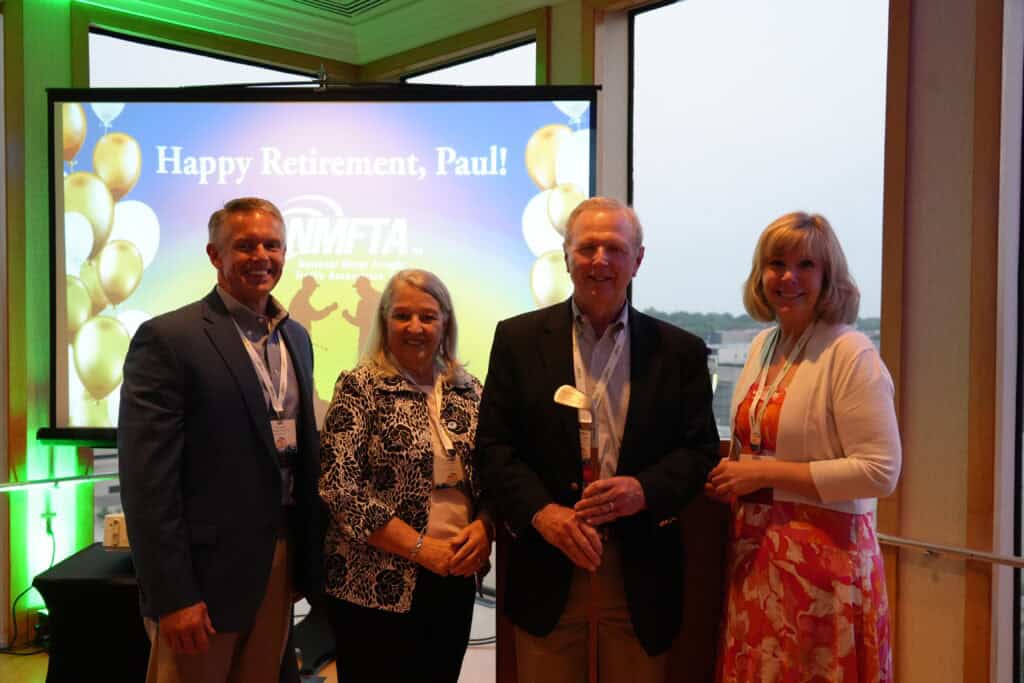 Clete Cordero with NMFTA colleagues during a retirement celebration for Paul Dugent